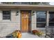 Charming front entrance with wood door and stone accents at 5861 S 100 W, Fountaintown, IN 46130