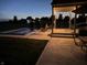 Relaxing pool area with patio and string lights, perfect for summer evenings at 3503 W 100 N, Bargersville, IN 46106