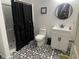 Stylish bathroom with black and white patterned floor at 3503 W 100 N, Bargersville, IN 46106