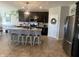 Modern kitchen with dark cabinetry, granite countertops and stainless steel appliances at 3503 W 100 N, Bargersville, IN 46106