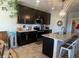 Well-equipped kitchen with dark cabinetry, granite counters, and an island at 3503 W 100 N, Bargersville, IN 46106