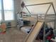 bedroom with a house-shaped bunk bed and slide at 3503 W 100 N, Bargersville, IN 46106