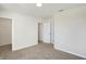 Well-lit bedroom with neutral walls and carpet at 3895 Wren Dr, Brownsburg, IN 46112