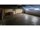 Unfinished basement with concrete floors and ample space at 2620 Wicker Rd, Indianapolis, IN 46217