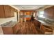 Eat-in kitchen with wood cabinets and granite countertops at 2620 Wicker Rd, Indianapolis, IN 46217