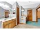 Large bathroom with walk-in shower, double vanity, and soaking tub at 6640 Greenridge Dr, Indianapolis, IN 46278