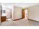 Bedroom with ceiling fan and access to bathroom and hallway at 6640 Greenridge Dr, Indianapolis, IN 46278