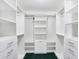 Spacious walk-in closet featuring built-in shelving and rods at 6640 Greenridge Dr, Indianapolis, IN 46278