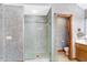 Large walk-in shower with glass enclosure and marble flooring at 6640 Greenridge Dr, Indianapolis, IN 46278