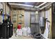Unfinished basement with water softener and HVAC system at 6640 Greenridge Dr, Indianapolis, IN 46278