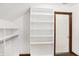Spacious walk-in closet with built-in shelves and hanging rods at 6640 Greenridge Dr, Indianapolis, IN 46278