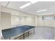 Finished basement recreation room with ping pong table and tiled floor at 6640 Greenridge Dr, Indianapolis, IN 46278