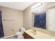 Basement bathroom with shower, toilet, and vanity at 6640 Greenridge Dr, Indianapolis, IN 46278