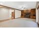 Living room with a brick fireplace and built-in wooden shelves at 6640 Greenridge Dr, Indianapolis, IN 46278