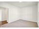 Spacious bedroom with neutral walls and carpeting at 7171 Rose Hill Ave, Brownsburg, IN 46112