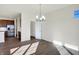 Dining area with hardwood floors and access to pantry at 7171 Rose Hill Ave, Brownsburg, IN 46112