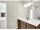 Bathroom with a vanity with white countertop and mirror at 7171 Rose Hill Ave, Brownsburg, IN 46112