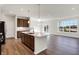 Modern kitchen with large island and stainless steel appliances at 7171 Rose Hill Ave, Brownsburg, IN 46112