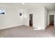 Spacious primary bedroom with carpet and access to the bathroom at 7171 Rose Hill Ave, Brownsburg, IN 46112