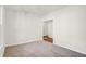 Well-lit bedroom featuring neutral walls and carpeting at 7171 Rose Hill Ave, Brownsburg, IN 46112