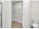 Walk-in closet with wire shelving and carpeted flooring at 7171 Rose Hill Ave, Brownsburg, IN 46112