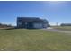 Gray house with two-car garage and grassy yard at 3503 W 100 N, Bargersville, IN 46106