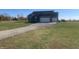 Gray house with two-car garage and grassy yard at 3503 W 100 N, Bargersville, IN 46106