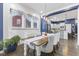 Bright dining room with farmhouse table and seating for six at 3577 Idlewind Dr, Westfield, IN 46074