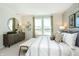 Serene main bedroom with water views and ample natural light at 18415 Depoe Ln, Westfield, IN 46074