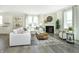 Bright living room features a cozy fireplace and comfortable seating at 18415 Depoe Ln, Westfield, IN 46074