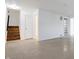 Unfinished basement with stairs, storage, and open space at 5607 Dollar Hide North Dr, Indianapolis, IN 46221