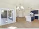 Bright dining area with hardwood floors and sliding glass doors at 7144 Rose Hill Ave, Brownsburg, IN 46112