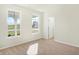 Bright bedroom featuring neutral carpeting and ample natural light at 7144 Rose Hill Ave, Brownsburg, IN 46112