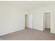 Well-lit bedroom featuring two closets and neutral carpeting at 7144 Rose Hill Ave, Brownsburg, IN 46112