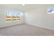 Bright bedroom with large windows and neutral carpeting at 7144 Rose Hill Ave, Brownsburg, IN 46112