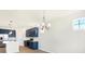 Modern kitchen with stainless steel appliances and blue cabinetry at 7144 Rose Hill Ave, Brownsburg, IN 46112