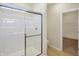 Bathroom with walk-in shower and access to closet at 7144 Rose Hill Ave, Brownsburg, IN 46112