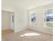 Spacious office with carpeting and large windows providing natural light at 7144 Rose Hill Ave, Brownsburg, IN 46112