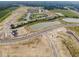 Aerial view of new homes, ponds, and walking paths in a new development at 245 Lar Lan Dr, Danville, IN 46122