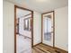 Inviting entryway with wood flooring and views to living room and porch at 521 Eagle Crest Dr, Brownsburg, IN 46112