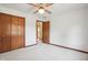 Bright bedroom with double doors and ceiling fan at 521 Eagle Crest Dr, Brownsburg, IN 46112