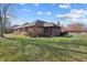 Ranch home with a large backyard and sunroom at 521 Eagle Crest Dr, Brownsburg, IN 46112