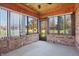 Bright sunroom featuring brick walls and multiple windows at 521 Eagle Crest Dr, Brownsburg, IN 46112