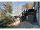 Landscaped backyard with patio, deck and hot tub at 6605 Donnelly Dr, Brownsburg, IN 46112