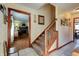 Inviting entryway with staircase, tile flooring, and charming decor at 6605 Donnelly Dr, Brownsburg, IN 46112
