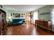 Elegant living room with hardwood floors, antique furniture, and a view of the entryway at 6605 Donnelly Dr, Brownsburg, IN 46112