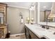Elegant bathroom with double vanity, large mirror, and plenty of counter space at 6902 Creekridge Trl, Indianapolis, IN 46256