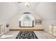 Charming bedroom with dormer window and built-in shelving at 6902 Creekridge Trl, Indianapolis, IN 46256