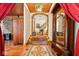 Elegant entryway with tile floor, arched entry, and stained glass light at 6902 Creekridge Trl, Indianapolis, IN 46256
