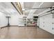 Finished garage with overhead storage and epoxy floor at 6902 Creekridge Trl, Indianapolis, IN 46256